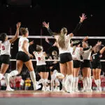 Nebraska celebrates their win at the historic 2023 Volleyball Day match in Memorial Stadium.