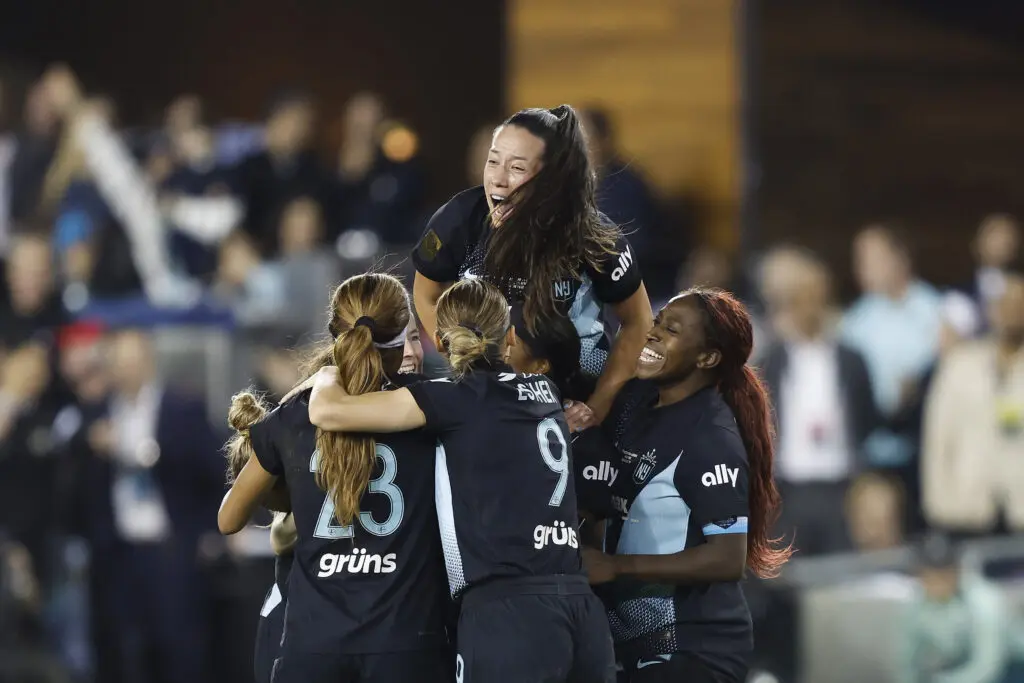 Gotham FC players celebrate Rose Lavelle's game-winning goal during the 2025 NWSL Championship match.