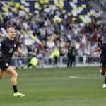 USWNT captain Lindsey Heaps and defender Kennedy Wesley run across the pitch to celebrate Heaps's goal during a 2026 SheBelieves Cup match.