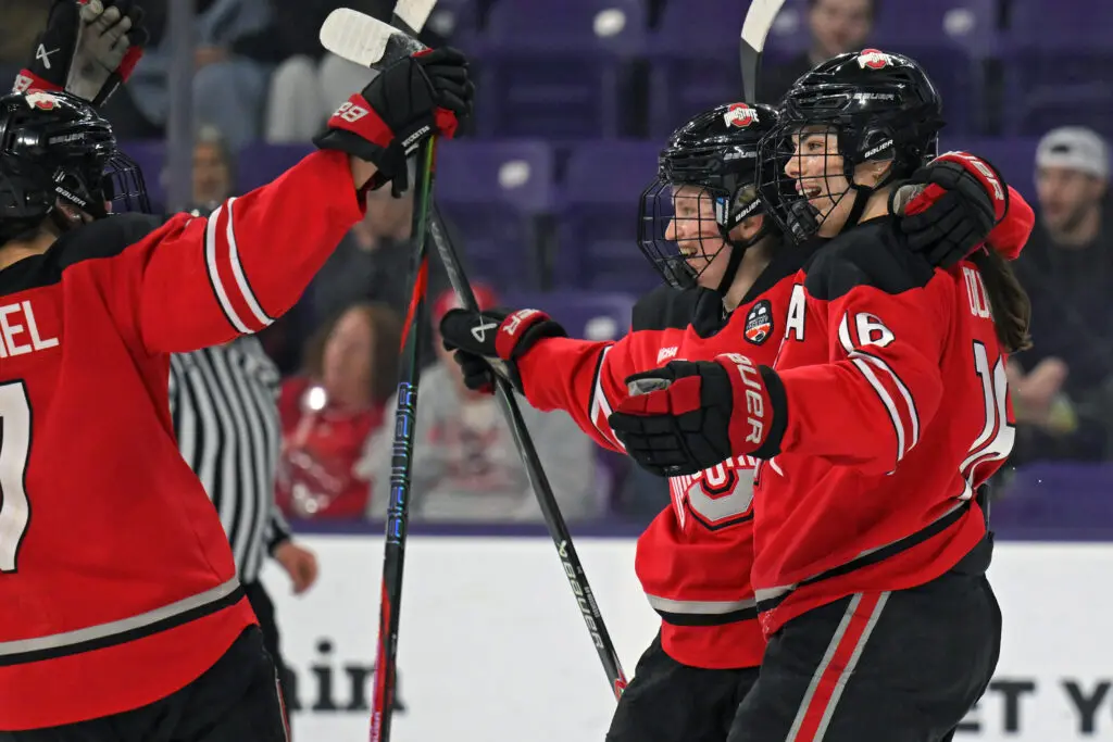 Ohio State hockey forward Hilda Svensson celebrates her goal with teammate Joy Dunne during the 2026 WCHA tournament final.