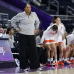 Ahead of her Women's March Madness appearance against UConn women's basketball, head coach Felisha Legette-Jack of the Syracuse Orange looks on against the California Golden Bears during the first quarter of the second round of the Women's ACC Tournament between the California Golden Bears and Syracuse Orange at Gas South Arena on March 05, 2026 in Duluth, Georgia.
