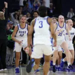Duke women's basketball players react to their overtime title win at the 2026 ACC tournament.