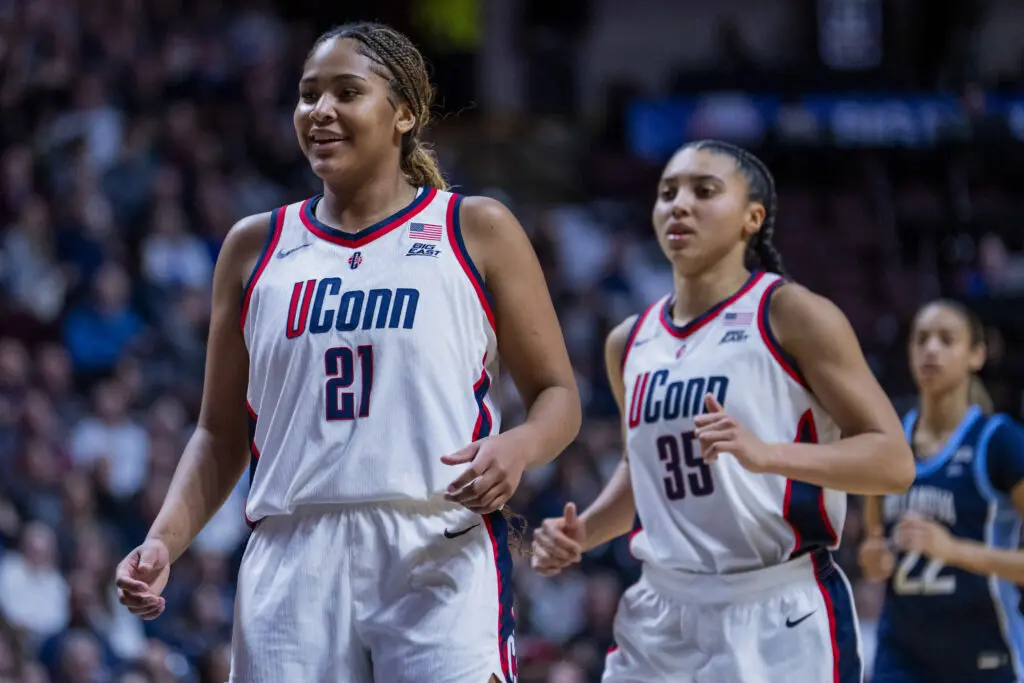 UConn stars Sarah Strong and Azzi Fudd jog across the court during the 2026 Big East women's basketball tournament championship game.