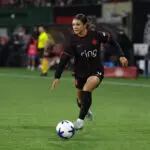 Portland Thorns forward Sophia Wilson dribbles the ball during a 2026 NWSL preseason match.
