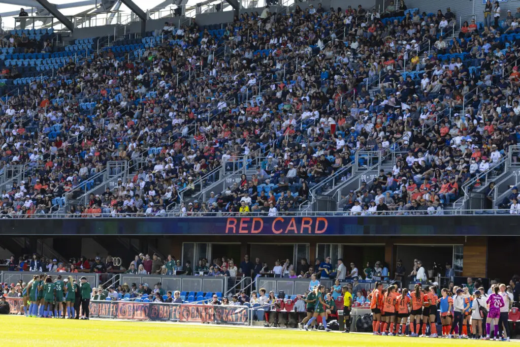 Denver defender Janine Sonis exits the pitch after the Summit captain earned a red card in the 2026 NWSL expansion club's debut match.