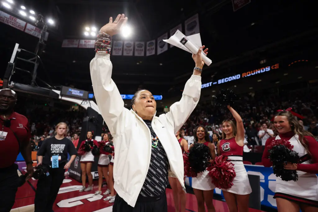 South Carolina head coach Dawn Staley waves to the crowd after the Gamecocks' second-round win at the 2025/26 NCAA women's basketball tournament.
