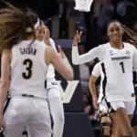 Vanderbilt women's basketball guard Mikayla Blakes points to teammate Aubrey Galvan in celebration of a play during their second-round 2026 March Madness game.