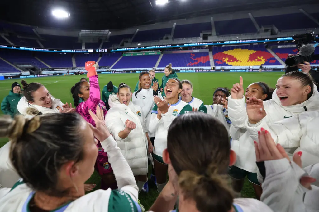 Denver Summit players celebrate their first-ever win after a 2026 NWSL match.