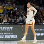 Sarah Graves #6 of the Texas Longhorns celebrates in the Elite Eight round of the 2026 NCAA Women's Basketball Tournament game between the Michigan Wolverines and the Texas Longhorns at Dickies Arena on March 30, 2026 in Fort Worth, Texas.