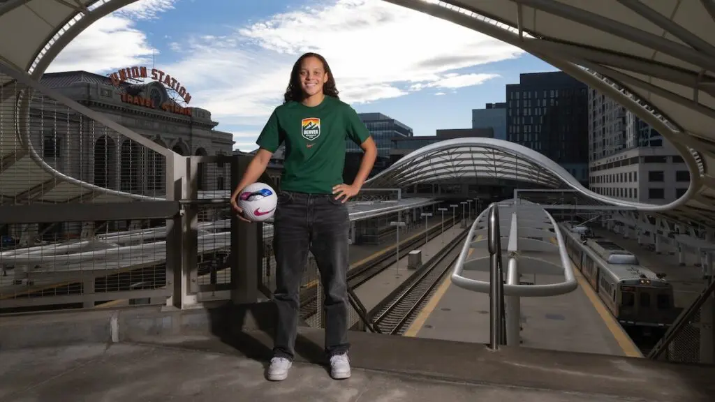 Denver Summit FC rookie Jasmine Aikey poses holding a soccer ball ahead of the 2026 NWSL season.