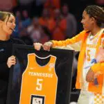 Tennessee’s Kaiya Wynn (5) is recognized by Tennessee basketball coach Kim Caldwell during senior day celebration before the start of the NCAA college basketball game against Vanderbilt on Mar. 1, 2026, in Knoxville, Tennessee.