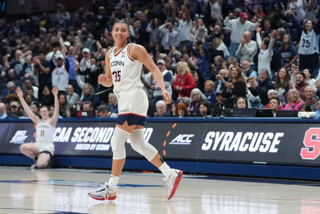 UConn Huskies guard Azzi Fudd (35) reacts to hitting a three point shot against the Syracuse Orange during the first half of the second round game of the women’s 2026 NCAA Tournament at Harry A. Gampel Pavilion. 