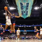 Sarah Strong #21 of the UConn Huskies blocks a shot by Raven Johnson #25 of the South Carolina Gamecocksduring the Division I Women's Basketball Championship game at Amalie Arena on April 6, 2025 in Tampa, Florida.