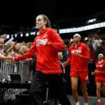 2026 WNBA broadcast schedule driver Caitlin Clark #22 of the Indiana Fever runs out of the team tunnel, to the court before the game against the Seattle Storm at Climate Pledge Arena on June 24, 2025 in Seattle, Washington. The Indiana Fever won 94-86.