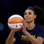 Brianna Turner #11 of the Indiana Fever warms up during warm up before the game against the Los Angeles Sparks at Crypto.com Arena on August 29, 2025 in Los Angeles, California.