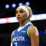 WNBA injury subject DiJonai Carrington #3 of the Minnesota Lynx looks on against the Seattle Storm in the first quarter at Target Center on August 28, 2025 in Minneapolis, Minnesota. The Storm defeated the Lynx 93-79.