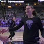 Carla Leite #0 of the Golden State Valkyries smiles before the game against the Minnesota Lynx during Game Two Round One of the 2025 WNBA Playoffs on September 17, 2025 at SAP Center in San Jose, California.