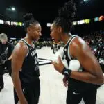 Jewell Loyd #24 and Chelsea Gray #12 of the Las Vegas Aces smiles after the game against the Seattle Storm on September 18, 2025 at Michelob ULTRA Arena n Las Vegas, Nevada.