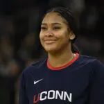 Sarah Strong #21 of the UConn Huskies smiles during halftime of the women's college basketball game between the UConn Huskies and the Providence College Friars on December 31, 2025, at Amica Mutual Pavilion in Providence, RI.