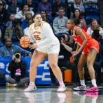 Audi Crooks #55 of the Iowa State Cyclones looks to pass during a first round game of the 2026 NCAA Women's Basketball Tournament held at Harry A. Gampel Pavilion on March 21, 2026 in Storrs, Connecticut.