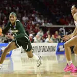 NCAA transfer portal candidate Rashunda Jones #1 of the Michigan State Spartans attempts to drive past Keziah Lofton #22 of the Oklahoma Sooners during the first quarter during a second round game of the 2026 NCAA Women's Basketball Tournament held at Lloyd Noble Center on March 22, 2026 in Norman, Oklahoma.