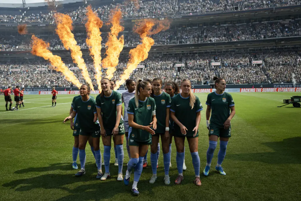 The Denver Summit FC starting lineup prepares to tale on the Washington Spirit during the first half on Saturday, March 28, 2026, at Empower Field at Mile High in Denver, Colo.