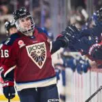 Hayley Scamurra #16 of the Montréal Victoire celebrates her empty net goal with teammates on the bench during the third period against the Vancouver Goldeneyes at Place Bell on April 1, 2026 in Laval, Quebec, Canada. The Montréal Victoire defeated the Vancouver Goldeneyes 3-0.