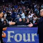 Dawn Staley of the South Carolina Gamecocks walks to shake hands with Geno Auriemma of the UConn Huskies prior to a NCAA Women's Final Four semifinal game at Mortgage Matchup Center on April 3, 2026 in Phoenix, Arizona.