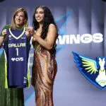 WNBA Commissioner Cathy Engelbert poses for a photo with Azzi Fudd after being drafted first overall by the Dallas Wings during the 2026 WNBA draft on April 13, 2026 at The Shed in New York, New York with ESPN viewership.