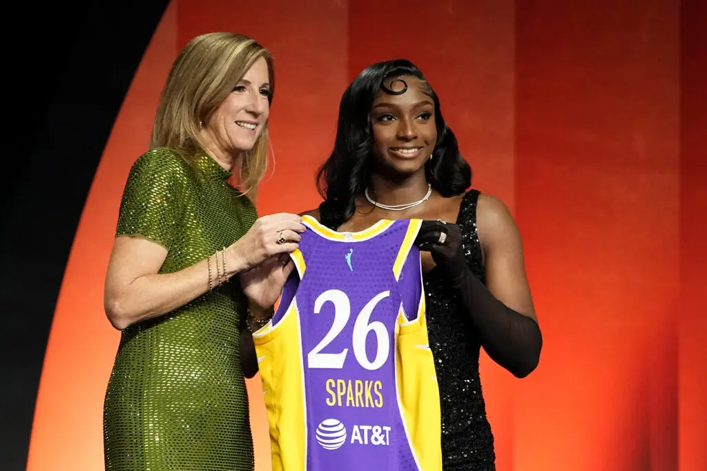 Ta’Niya Latson (R) of South Carolina poses with WNBA Commissioner Cathy Engelbert (L) after being selected with the 20th pick in the second round by the Los Angeles Sparks during the 2026 WNBA Draft at The Shed on April 13, 2026 in New York City.