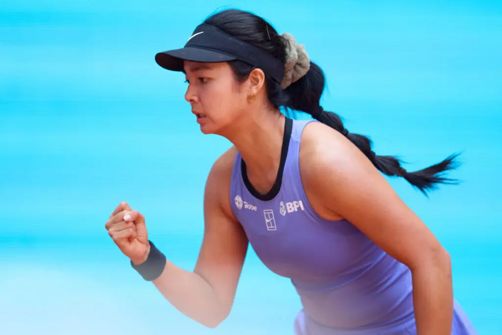 Alexandra Eala of the Philippines celebrates winning a point against Anastasia Pavlyuchenkova during the Women’s Singles First Round match at Manolo Santana Stadium on day three of the Mutua Madrid Open at La Caja Magica on April 22, 2026 in Madrid, Spain.