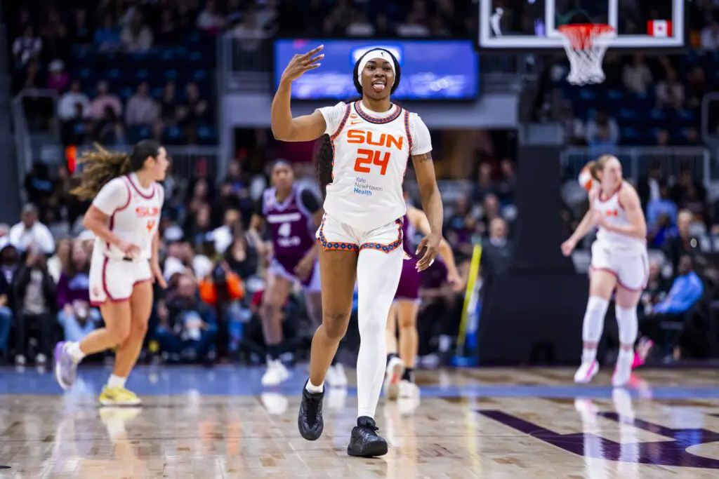 Aneesah Morrow #24 of the Connecticut Sun celebrates a three-pointer during the preseason game at Coca-Cola Coliseum on April 29, 2026 in Toronto, Canada.