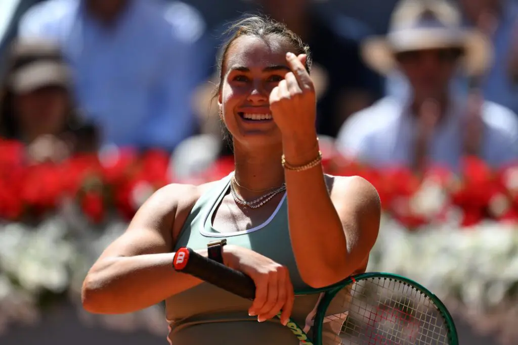 Aryna Sabalenka of Belarus celebrates winning match point and thanks the fans applause after victory against Naomi Osaka of Japan on Day 8 of the Mutua Madrid Open at La Caja Magica on April 27, 2026 in Madrid, Spain.