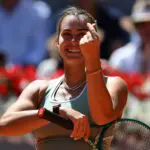Aryna Sabalenka of Belarus celebrates winning match point and thanks the fans applause after victory against Naomi Osaka of Japan on Day 8 of the Mutua Madrid Open at La Caja Magica on April 27, 2026 in Madrid, Spain.