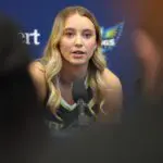 Paige Bueckers #5 of the Dallas Wings responds to media questions and her relationship with Azzi Fudd during 2026 Dallas Wings Media Day at College Park Center on April 27, 2026 in Arlington, Texas.