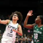 Olivia Miles #5 of the Minnesota Lynx drives with the ball as Promise Amukamara #10 of Nigeria defends during the preseason game at T-Mobile Center on April 27, 2026 in Kansas City, Missouri.