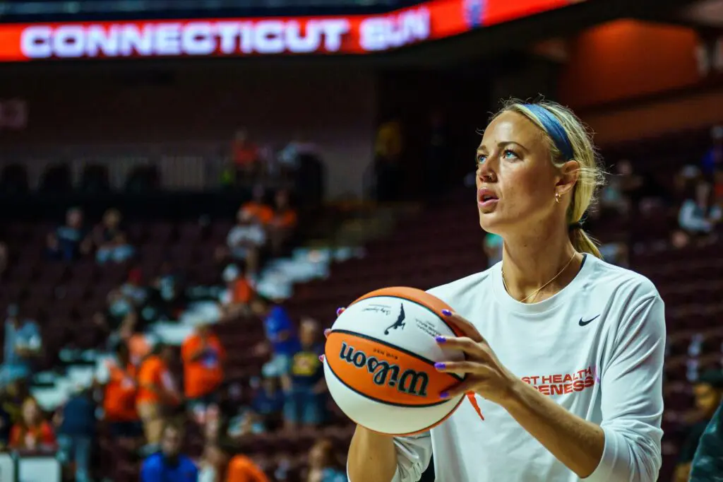 Indiana Fever guard Sophie Cunningham (8) warms up before the start of the game against the Connecticut Sun at Mohegan Sun Arena before the Sophie Cunningham contract issue.