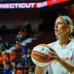 Indiana Fever guard Sophie Cunningham (8) warms up before the start of the game against the Connecticut Sun at Mohegan Sun Arena before the Sophie Cunningham contract issue.