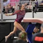 University of Oklahoma gymnast Faith Torrez celebrates after performing on vault during semifinals for the 2026 NCAA Women’s Gymnastics National Championships at Dickies Arena.