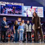 Former Connecticut Husky Sue Bird speaks during her jersey retirement ceremony before an NCAA women’s basketball game against the DePaul Blue Demons at Harry A. Gampel Pavilion on December 07, 2025 in Storrs, Connecticut.
