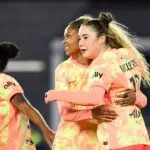 Olivia Moultrie #13 of Portland Thorns FC celebrates scoring her team's first goal during the NWSL match between Washington Spirit and Portland Thorns FC at Audi Field on March 13, 2026 in Washington, DC.