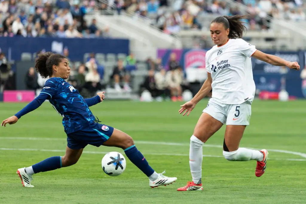 San Diego Wave FC defender Kennedy Wesley (2) and Bay FC forward Karlie Lema (5) compete for the ball during a NWSL match between Bay FC and San Diego Wave FC on May 3, 2026 at Snapdragon Stadium in San Diego, CA.