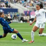 San Diego Wave FC defender Kennedy Wesley (2) and Bay FC forward Karlie Lema (5) compete for the ball during a NWSL match between Bay FC and San Diego Wave FC on May 3, 2026 at Snapdragon Stadium in San Diego, CA.