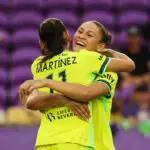Claudia Martinez #11 of Washington Spirit celebrates scoring her team's third goal with teammate Trinity Rodman #2 during the NWSL match between Orlando Pride and Washington Spirit at Inter&Co Stadium on May 02, 2026 in Orlando, Florida.
