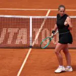 Jelena Ostapenko of Latvia celebrates winning a point against Anna Kalinskaya in their Round of 16 match at the Italian Open 2026.