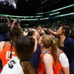 The Connecticut Sun huddle after defeating the Seattle Storm at Climate Pledge Arena on May 20, 2026 in Seattle, Washington after Sun vs Storm WNBA game.