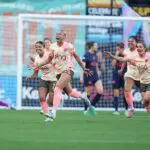 M.A. Vignola #25 of Portland Thorns FC celebrates with teammates after scoring her team's first goal during the NWSL match between Portland Thorns FC and Bay FC at Providence Park on May 20, 2026 in Portland, Oregon ahead of the Thorns vs Kansas City Current NWSL standings showdown.