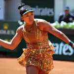 Japan's Naomi Osaka plays a forehand return to Germany's Laura Siegemund during their women's singles match on day 3 of the French Open 2026 tennis tournament on Court Suzanne-Lenglen at the Roland Garros Complex in Paris on May 26, 2026.