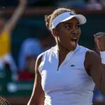 Venus Williams reacts to winning the second set
