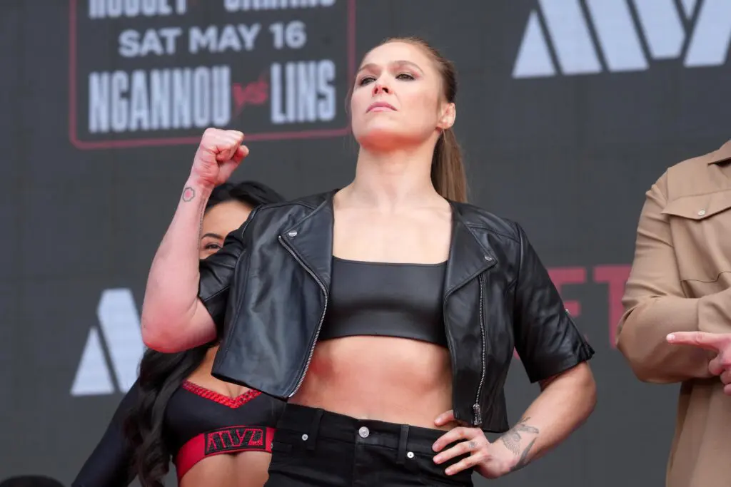 Ronda Rousey poses at a press conference.